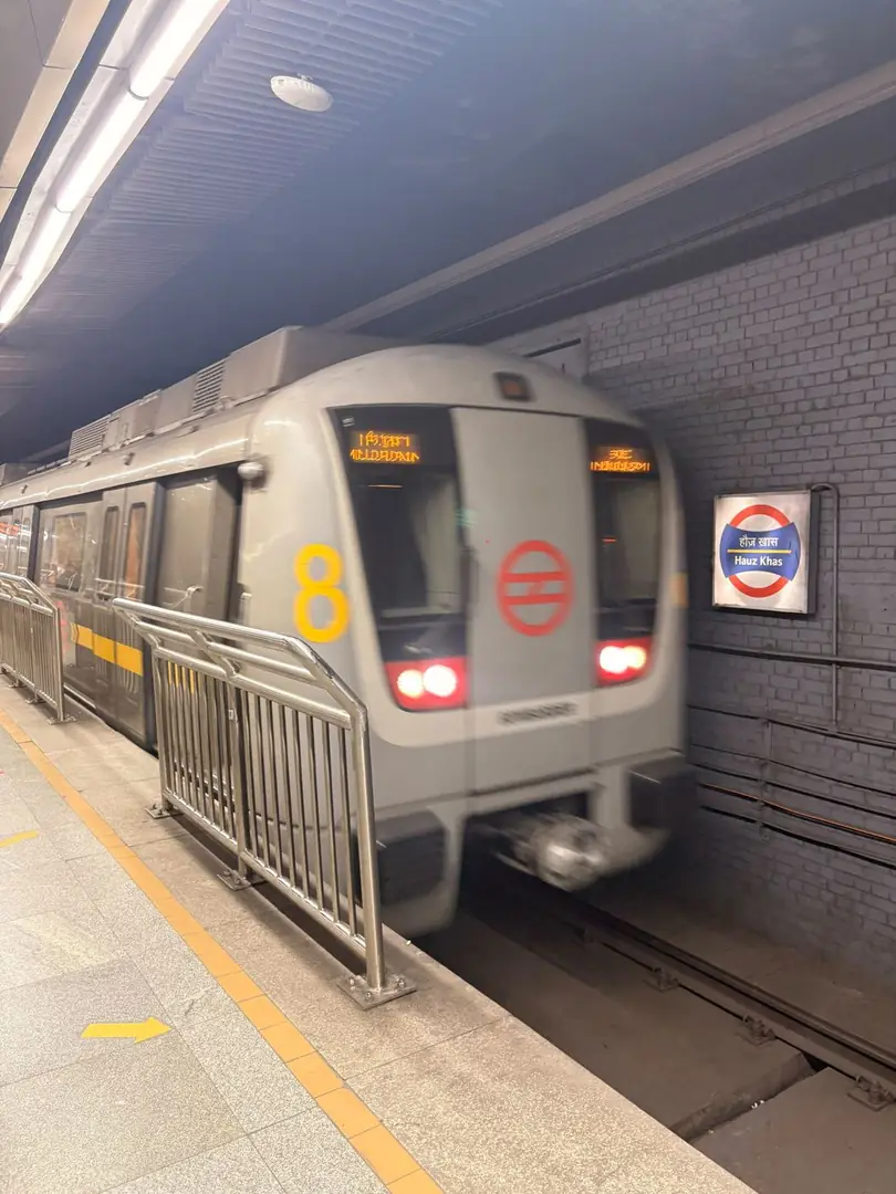 A Delhi Metro train pulling into the platform. Photograph by Arav Jain.